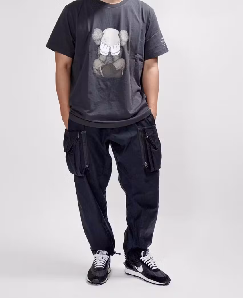 KAWS x Uniqlo Tokyo First Tee (Japanese Sizing) Dark Grey KAWS x Uniqlo Tokyo First Tee (Japanese Sizing) Dark Grey